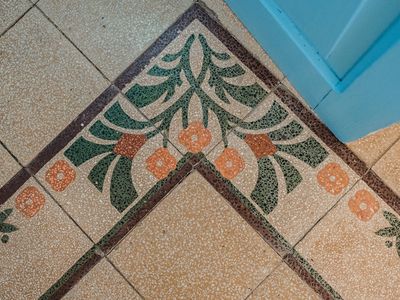 Dettaglio del mosaico del pavimento in Camera Salvia.