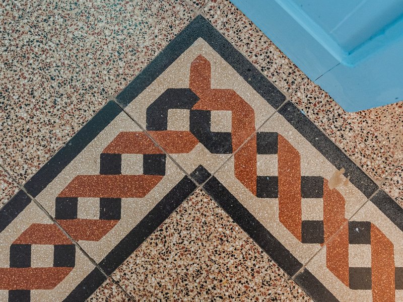 Mosaico decorativo del pavimento in Camera Sabbia.